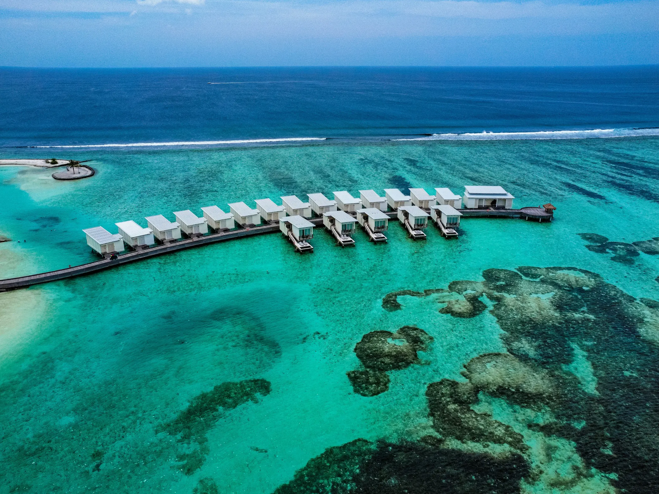 Cinematic aerial shot of a hospitality property at golden hour